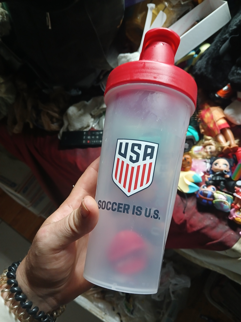 shows a U.S. Soccer branded plastic shaker bottle featuring a translucent clear